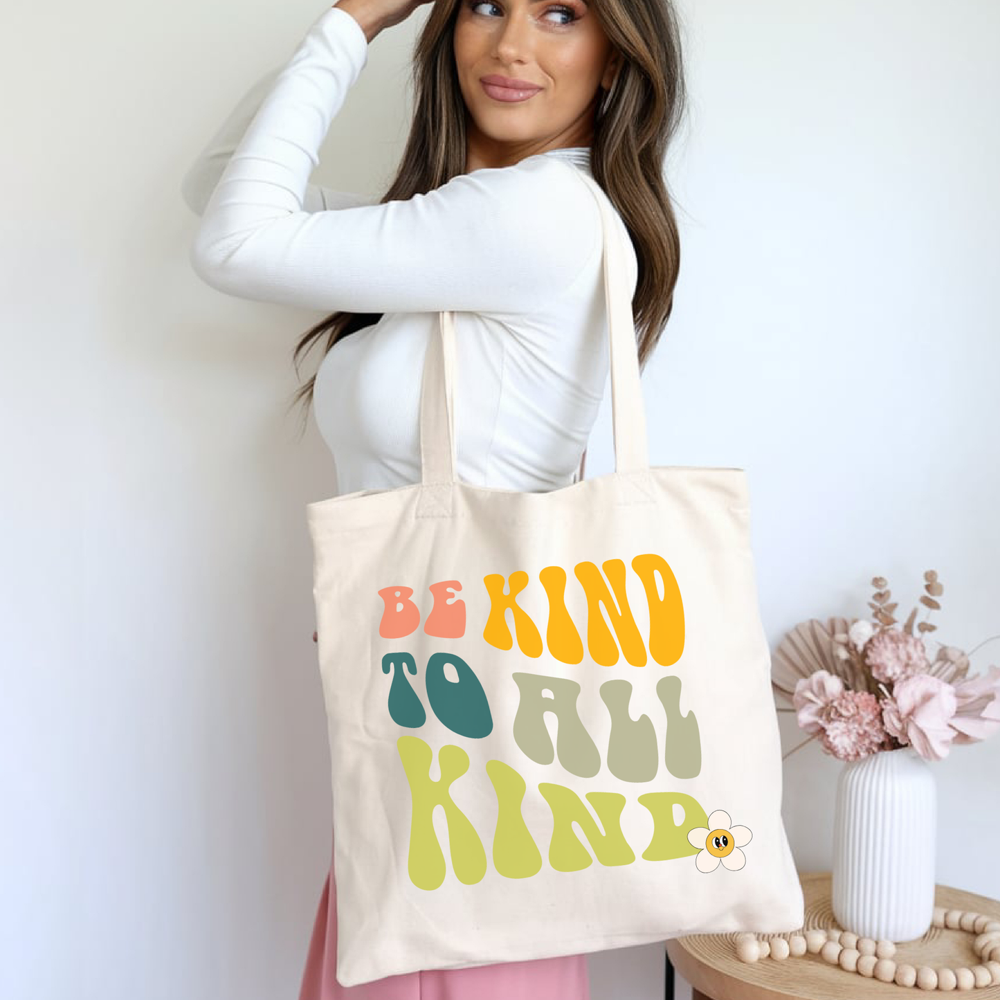 Retro tote bag with “Be Kind to All Kind” slogan in groovy typography