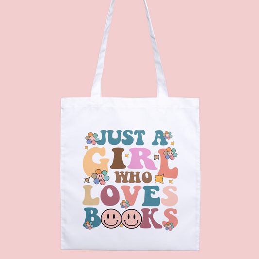 Retro ‘Just A Girl Who Loves Books’ tote bag, perfect for book lovers and bibliophiles.