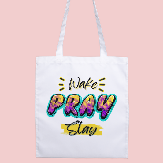 Vibrant pop art ‘Wake, Pray, Slay’ motivational tote bag, perfect for self-care and empowerment.