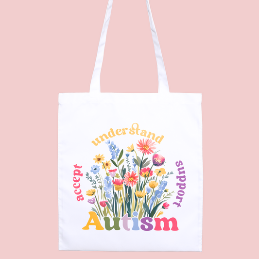Wildflower-themed ‘Autism, Accept, Understand, Support’ tote bag, celebrating neurodivergence and inclusivity.