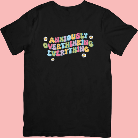 Anxiously Overthinking retro-inspired crew neck t-shirt featuring bold, colourful typography on a soft, unisex cotton blend fabric—perfect for mental health awareness and comfy everyday wear.