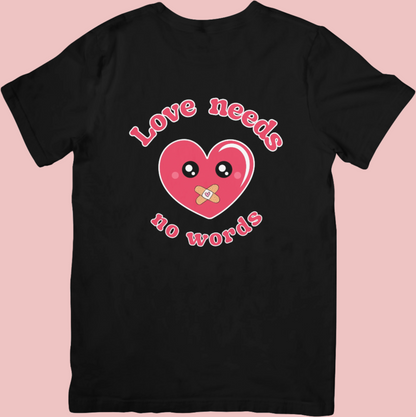 Retro-style crew neck t-shirt with a kawaii heart design and the phrase ‘Love Needs No Words,’ supporting autism awareness and neurodiversity.